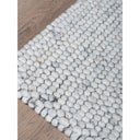 Home67 Vloerkleed POOL Ivoor op tafel of dressoir